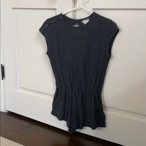 Gray Romper with an open back and pockets